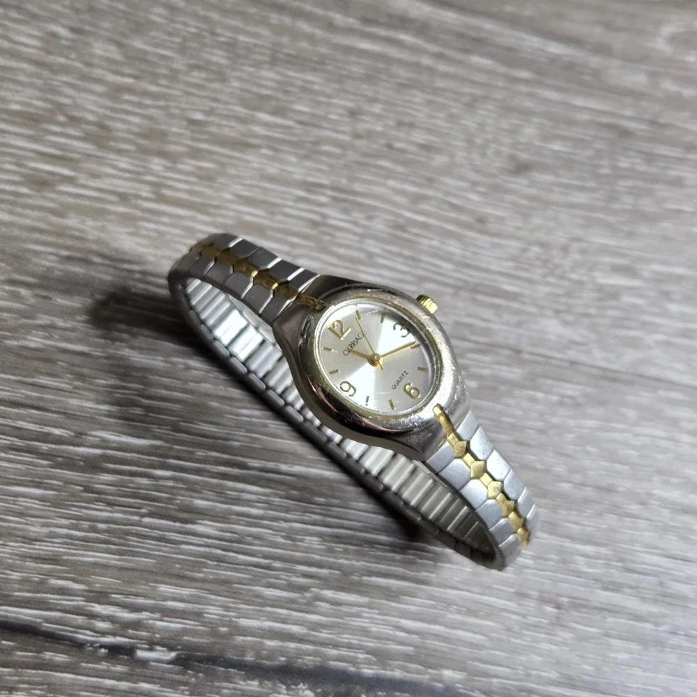 Timex Carriage Women's Quartz Watch Silver Gold Tone Stretch Band Analog Dress